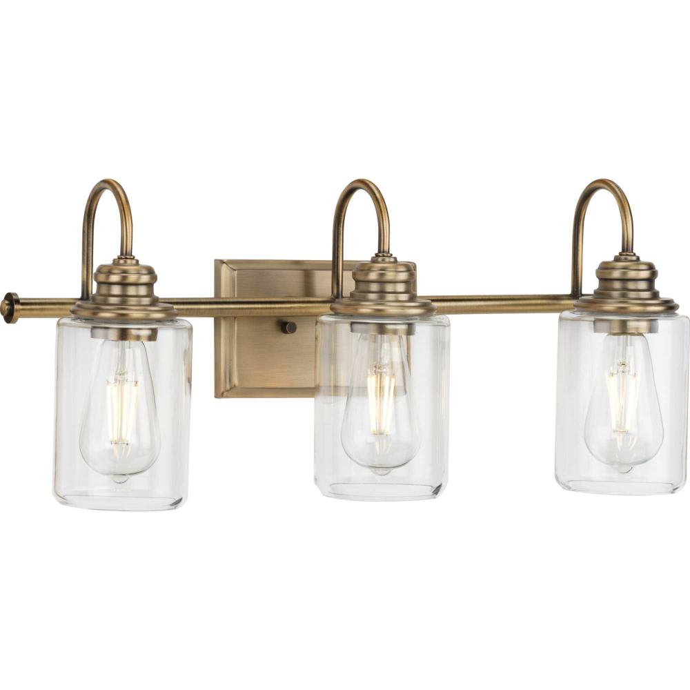 Aiken Collection Three-Light Clear Glass Vintage Style Brass Farmhouse Style Bath Vanity Wall Light